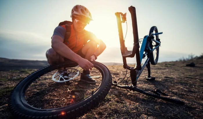 how to fix flat bike tire without tools