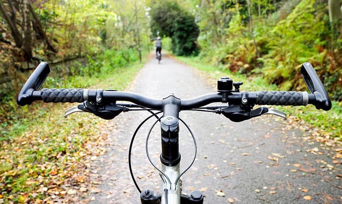 How do you raise the hot sale handlebars on a mountain bike