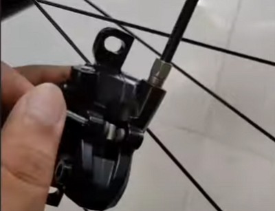 clean-disc-brakes-on-a-bike without-removing-wheel-step-2